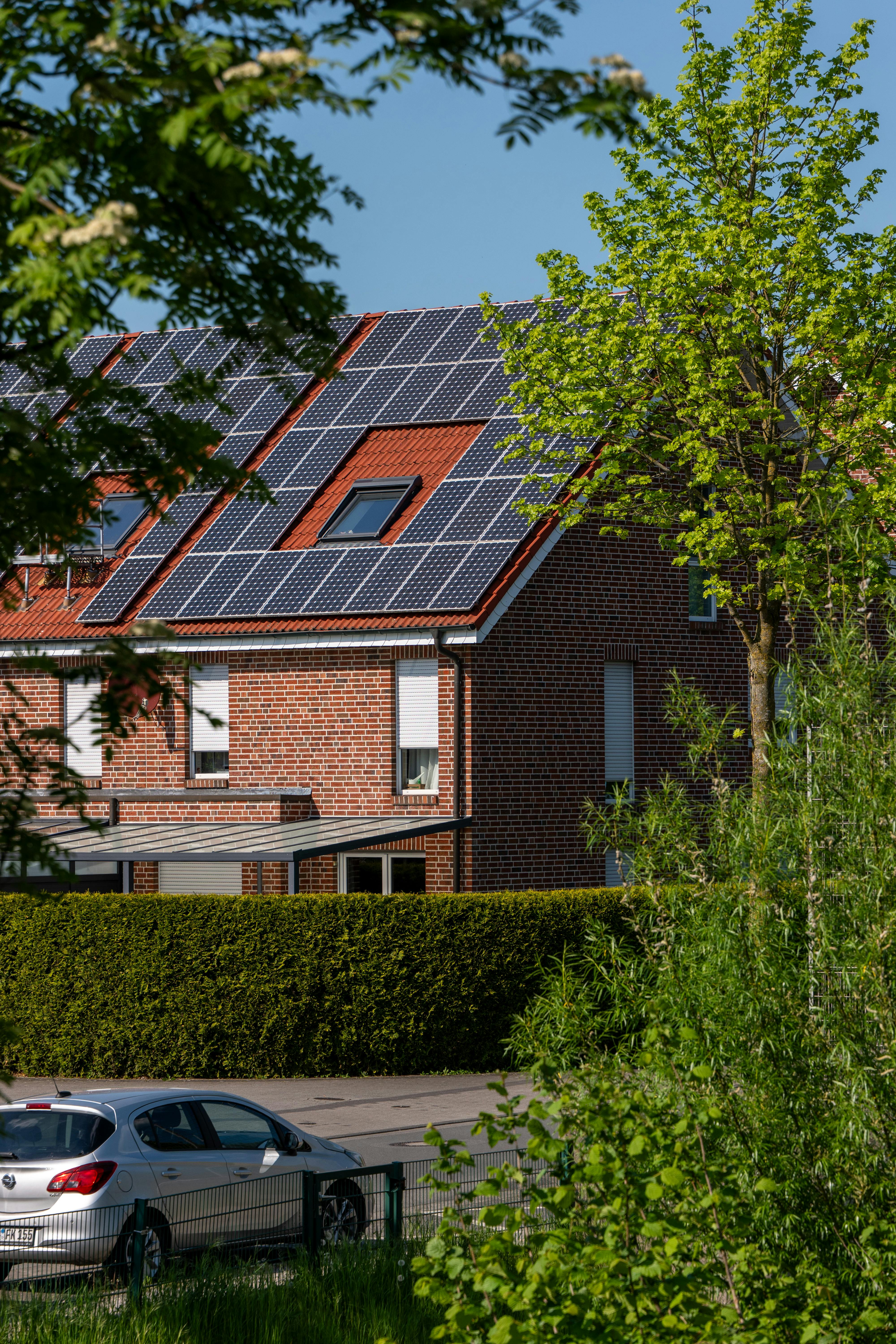 Irish semi-detached homes with solar panels in green countryside